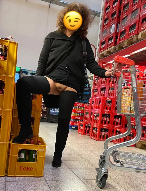 (F) shopping at the liquor store.