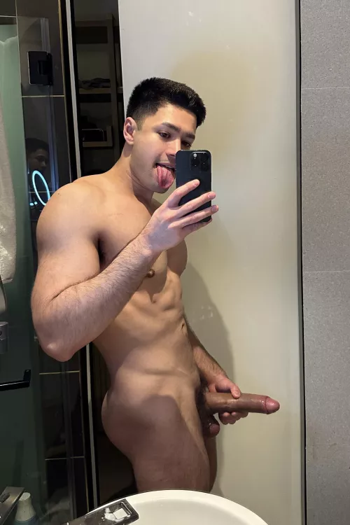 Tongue out… and something else