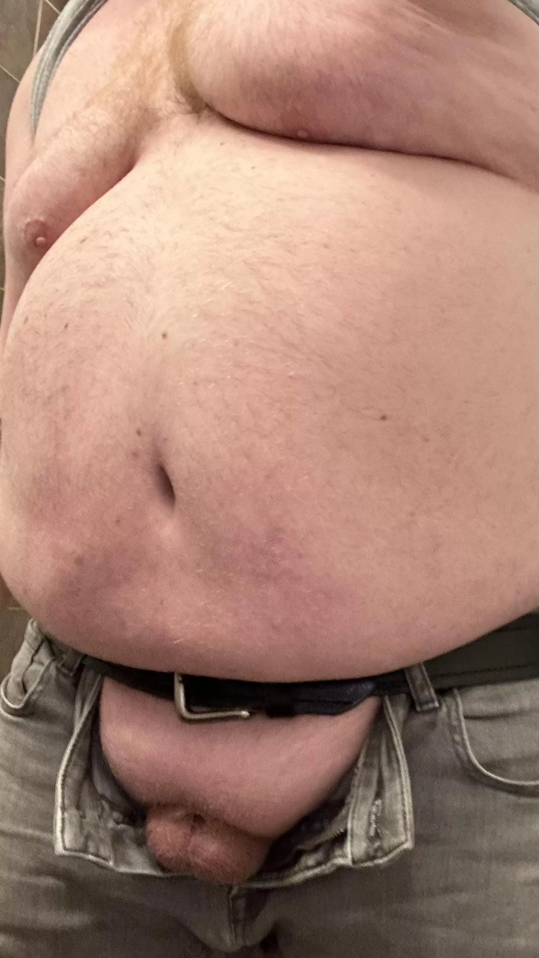 34 My contribution to Tummy Tuesday. Daddy’s been working on the car all afternoon, who’s gonna get me hard and take my three day load?