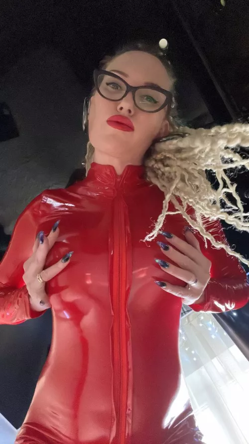 Black glasses and red tight clothes