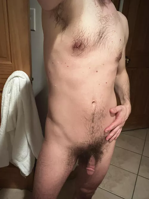 like a hyper-realistic statue if david