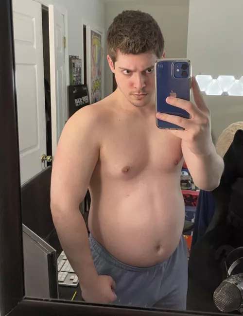 Rubbing my belly everyday so it helps it grow