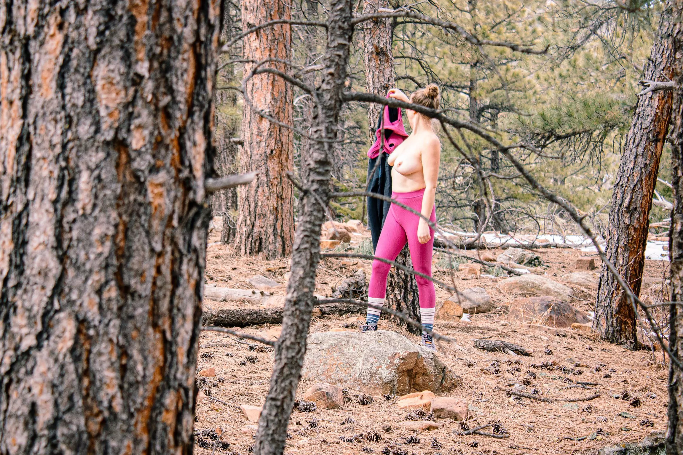 Trees make great hangers for your clothes while you undress in the woods