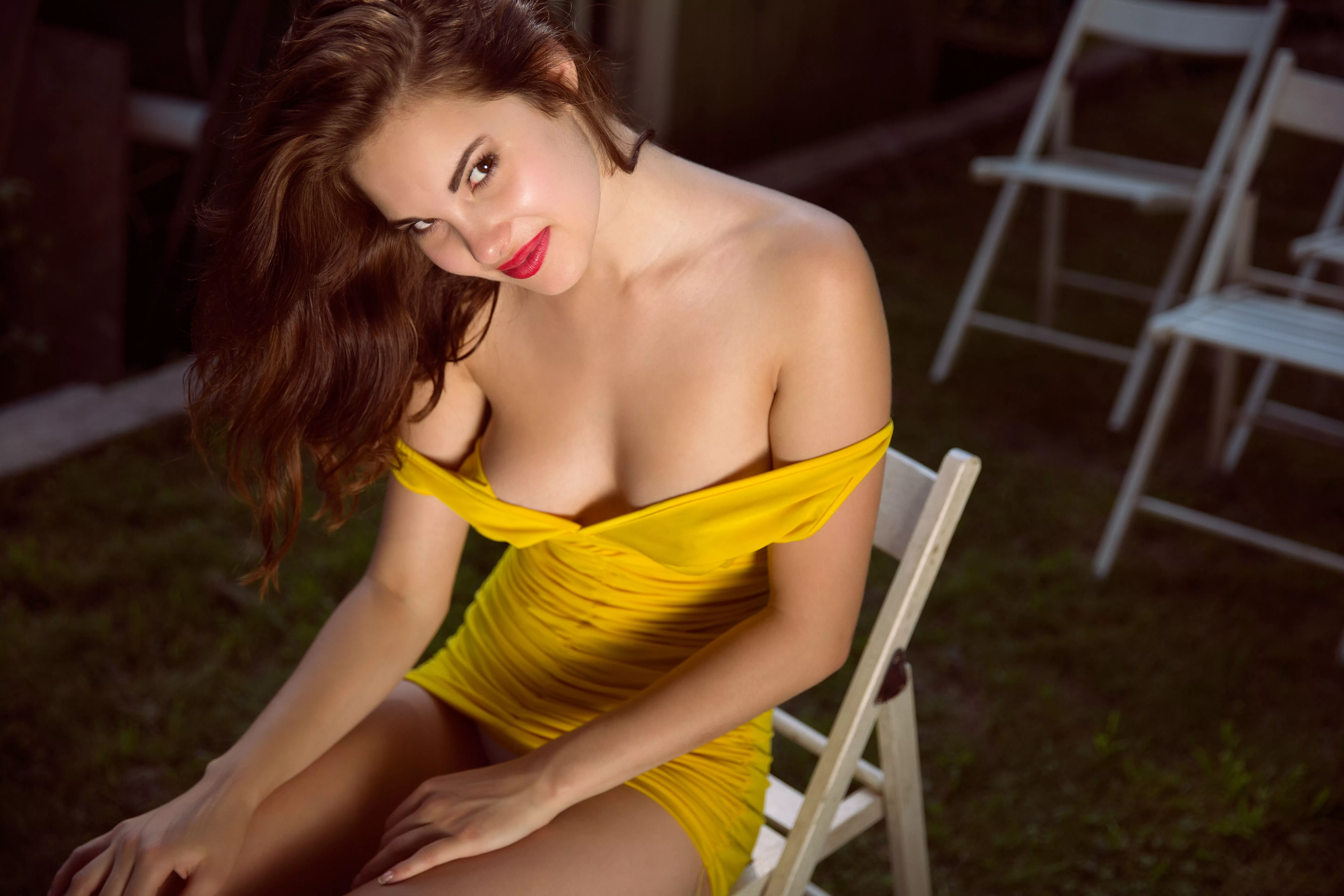 in the sun with a seductive smile