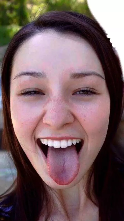 Tongue out all the way ;)