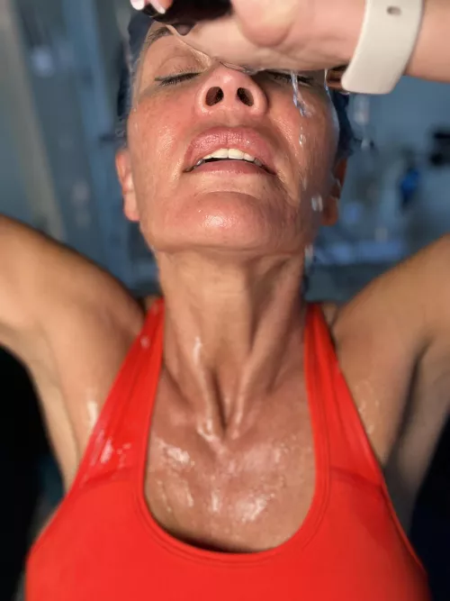 Wringing out the sweat. My eyes look like cherry tomatoes from the sweat dripping into them