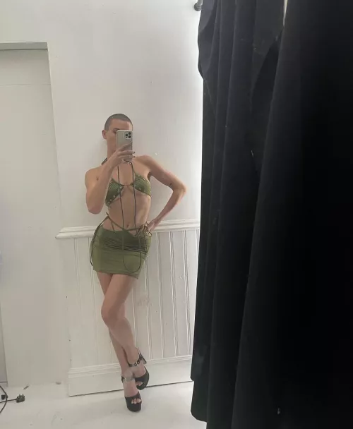 Rex looking hot in a skimpy top and tight and short skirt