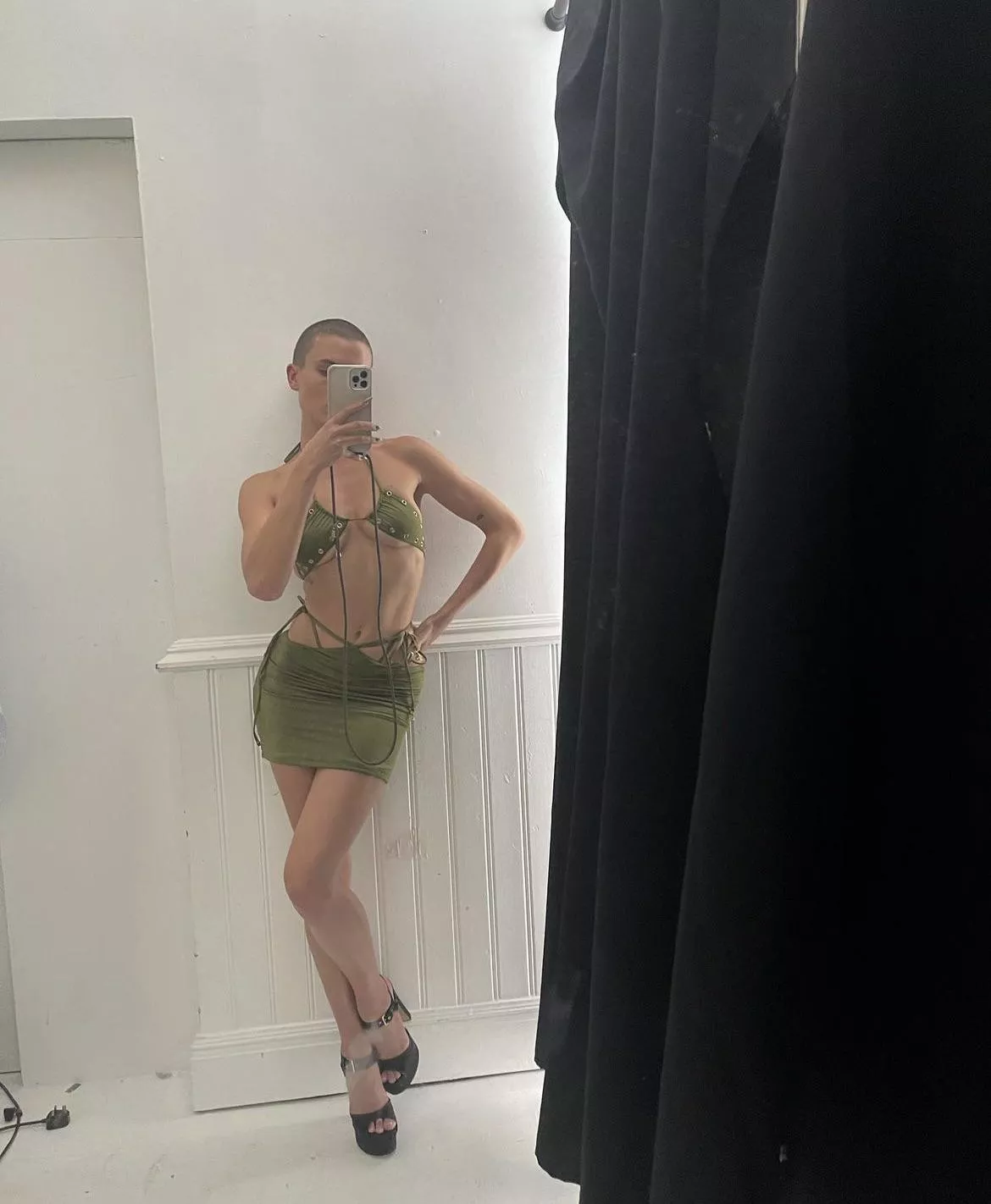 Rex looking hot in a skimpy top and tight and short skirt