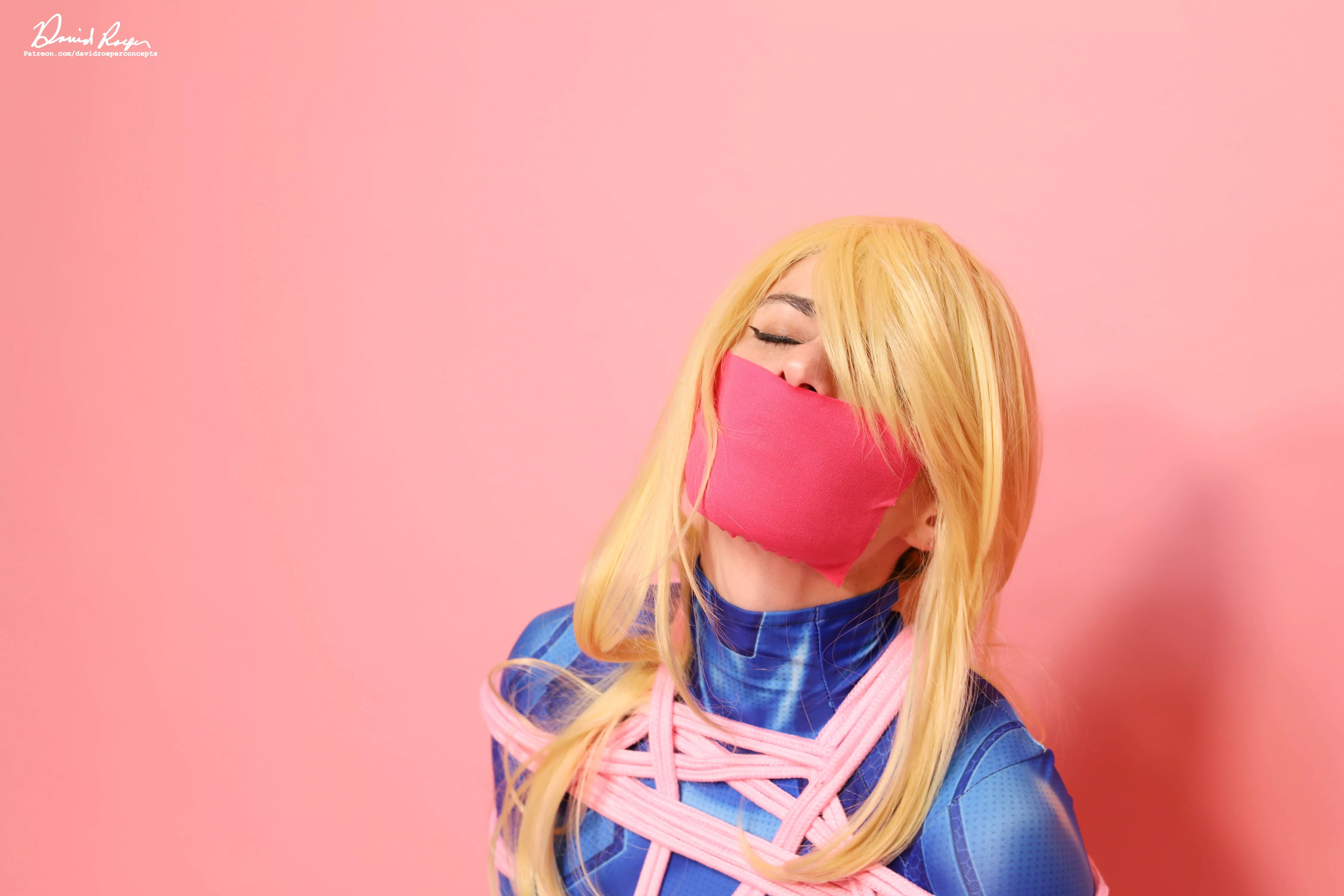 Samus got captured by space pirates. She's pretty speechless about it.