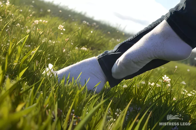Enjoy my feet in white socks at the grass