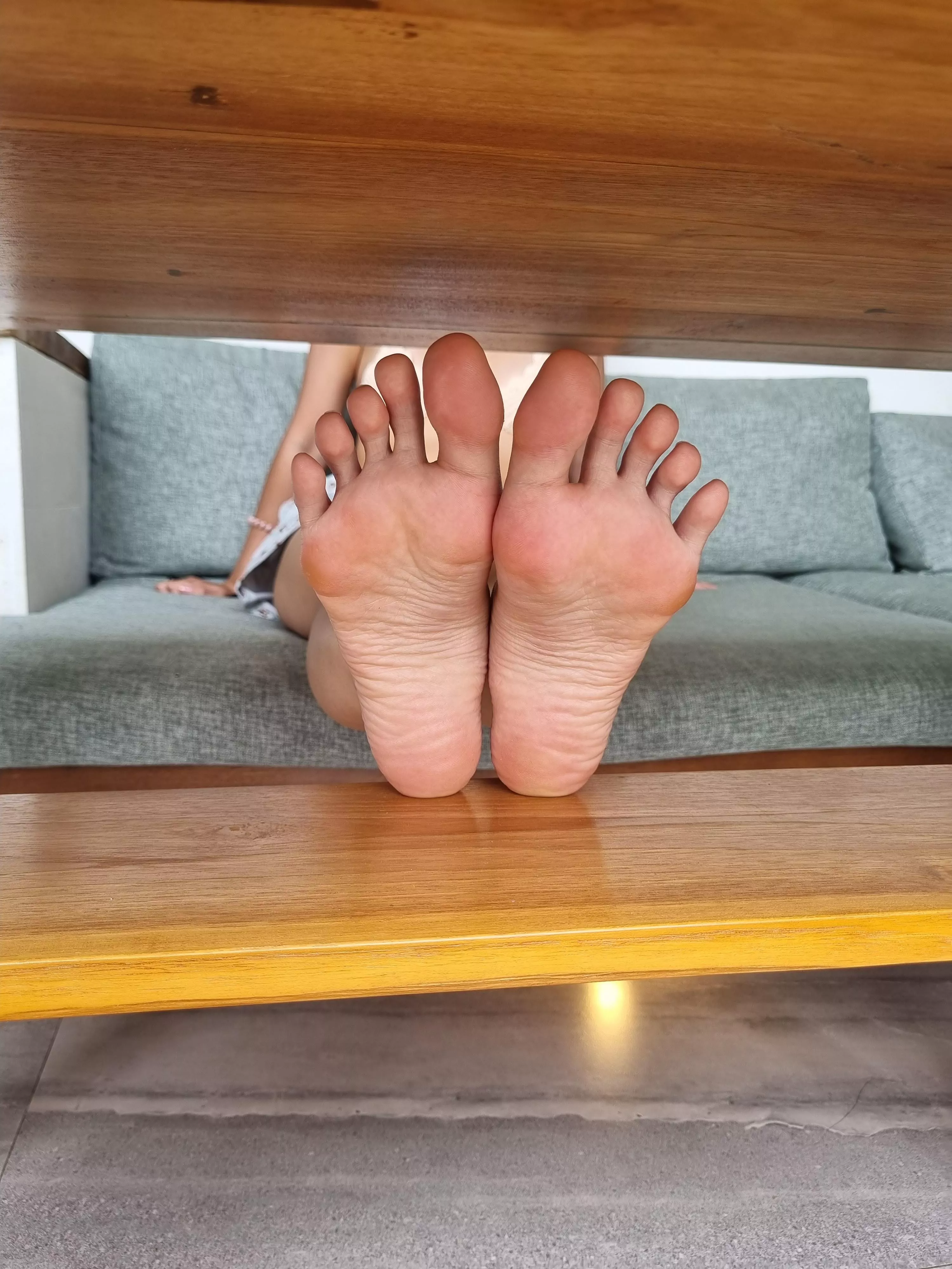 We are sitting in cafe and you lean down to pick up fallen fork and see this