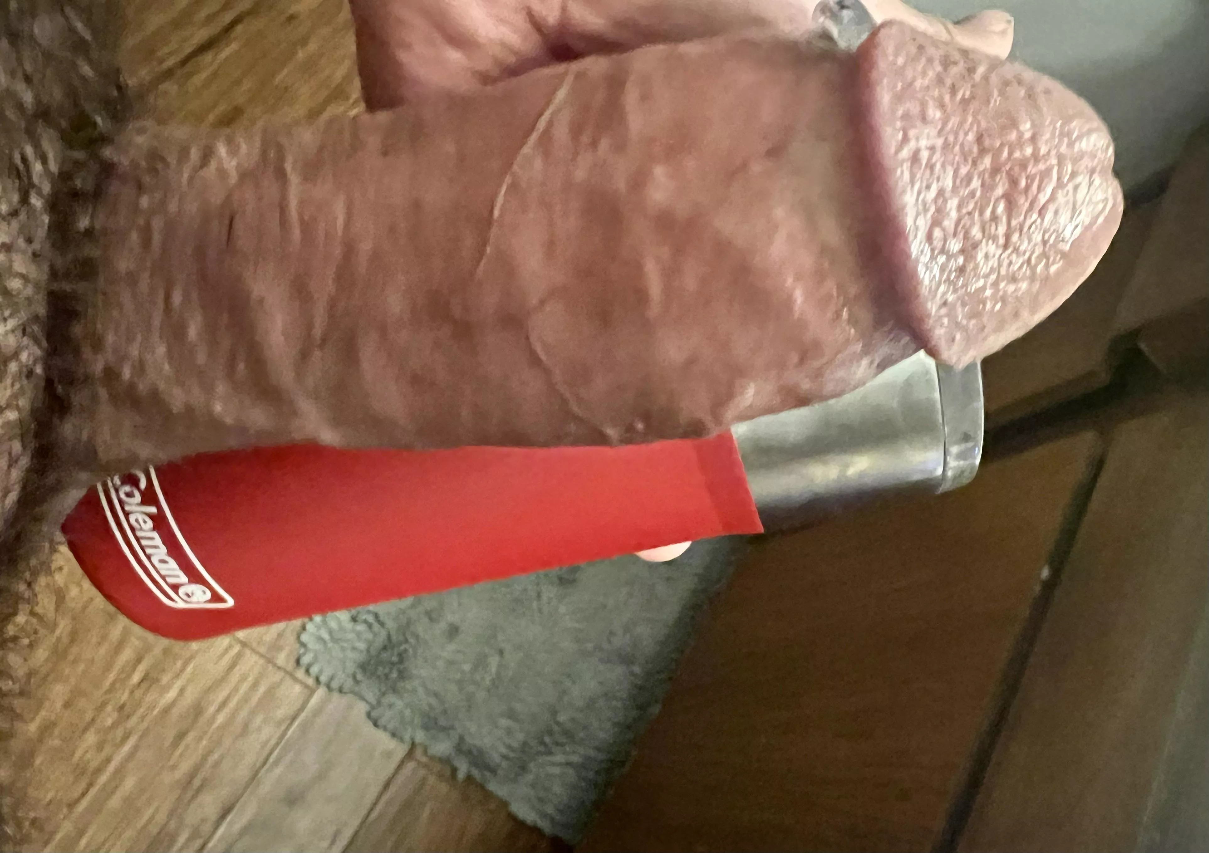 Against my coleman insulated coffee cup. Keeps hot things hot ;)