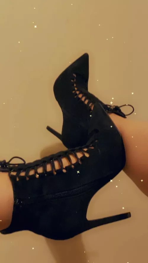 Black lace-up stiletto boots