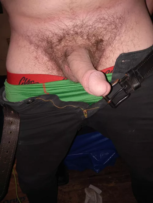 Half mast or a little higher.