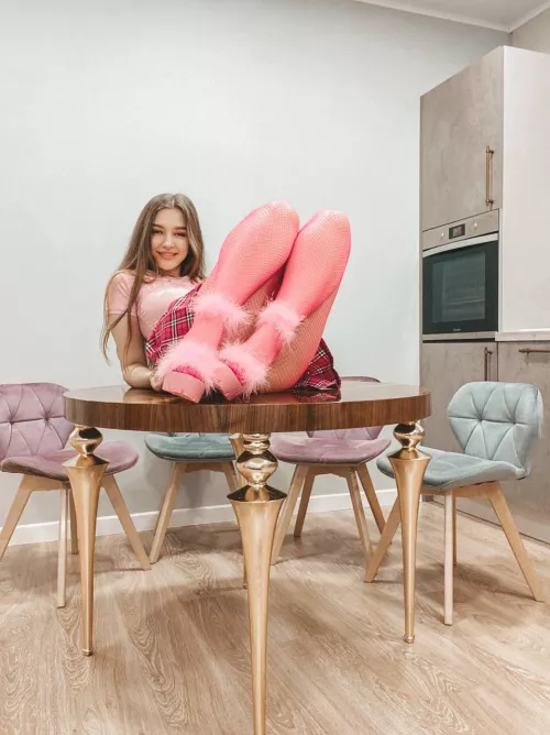 Heels on the table, because I'm such a naughty girl. What will you do about that?