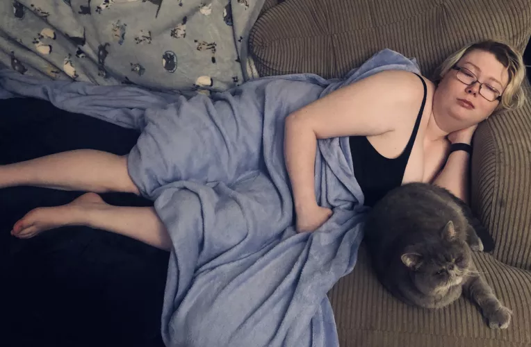 My partner took this pic of me and my cat resting, what do y’all think :3 ?