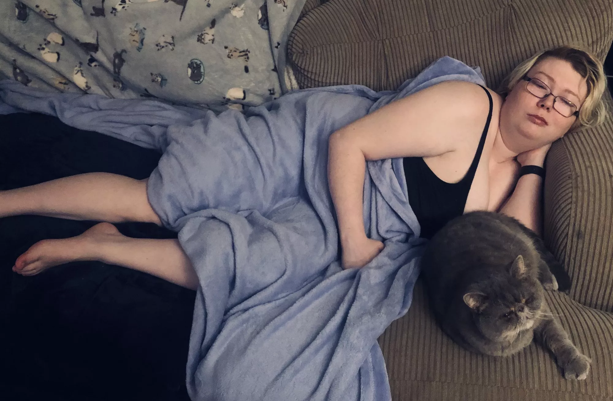 My partner took this pic of me and my cat resting, what do y’all think :3 ?