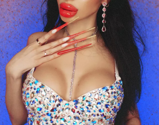 Shiny tits in a new corset