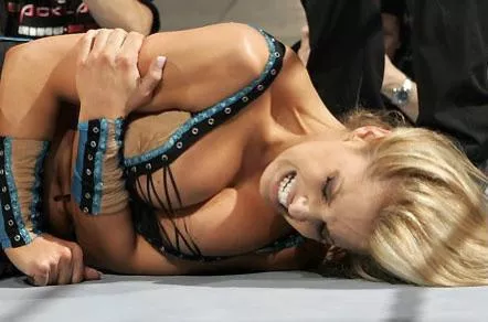 Trish Stratus' top holding everything together