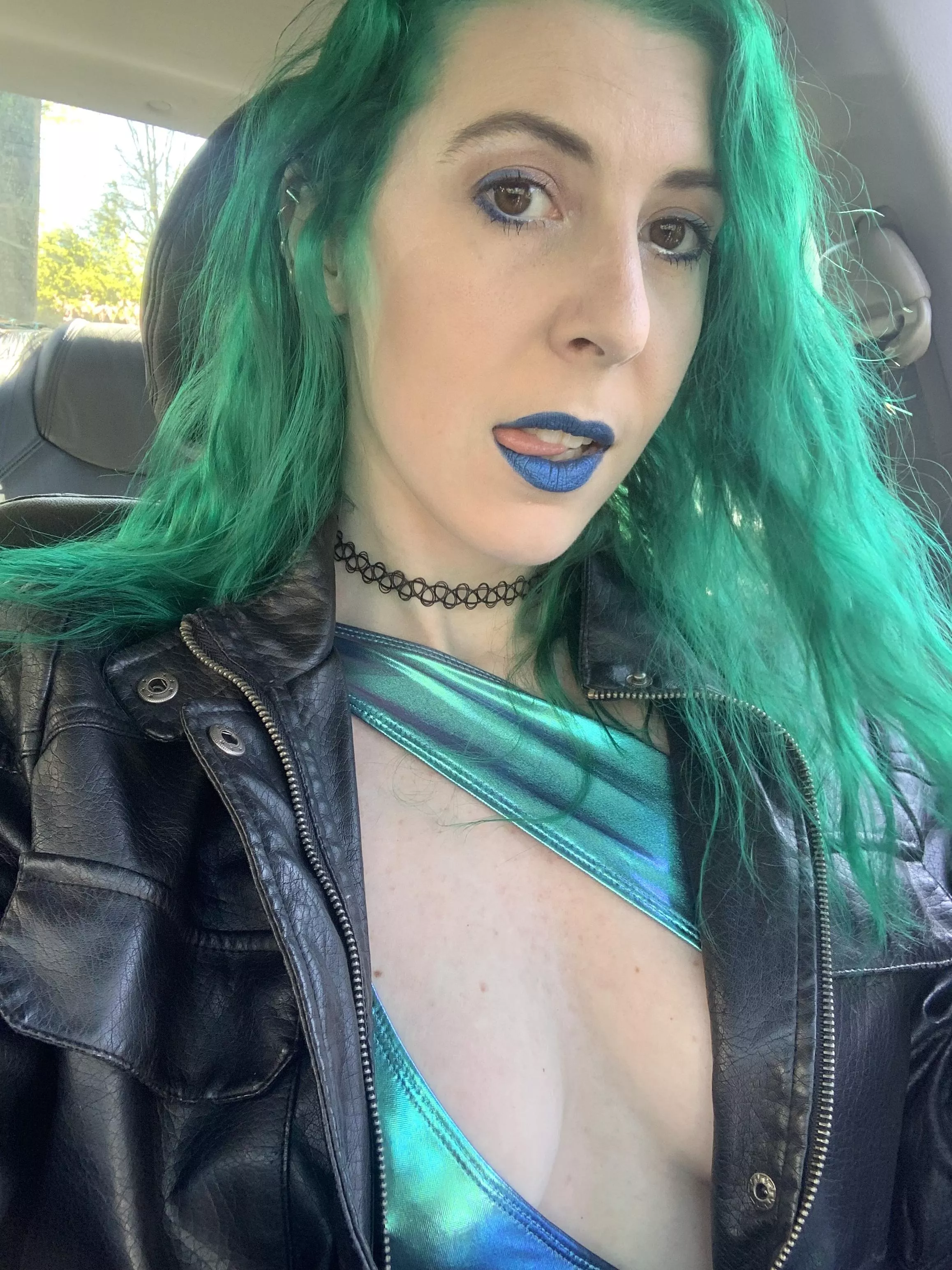 Green and blue car selfie