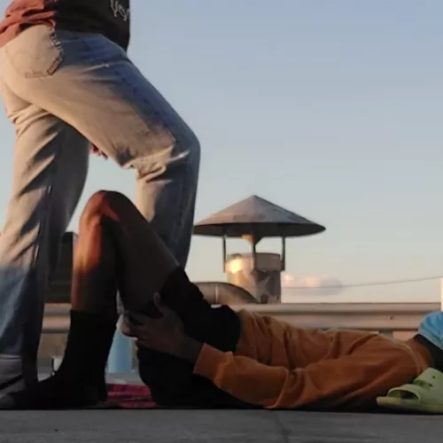 Her soft soles hurt so good on my poor balls.