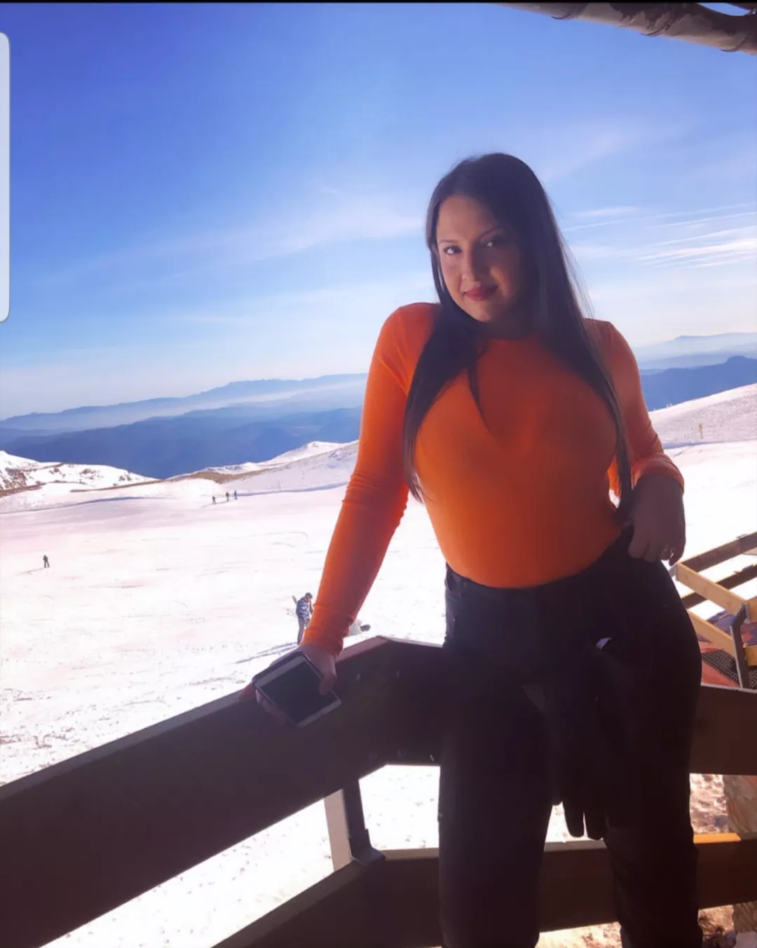 It is not just the colour of her top that attracts attention