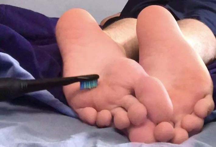 Feet Tickled By Toothbrush