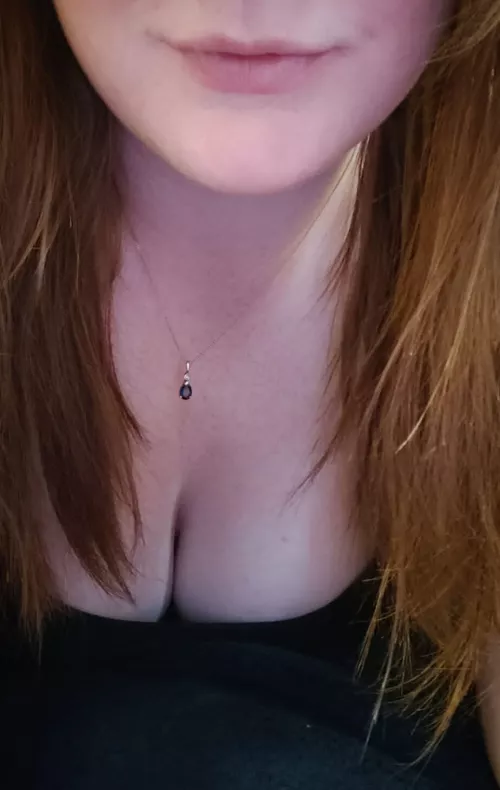 Just a hint of cleavage and lips for you x