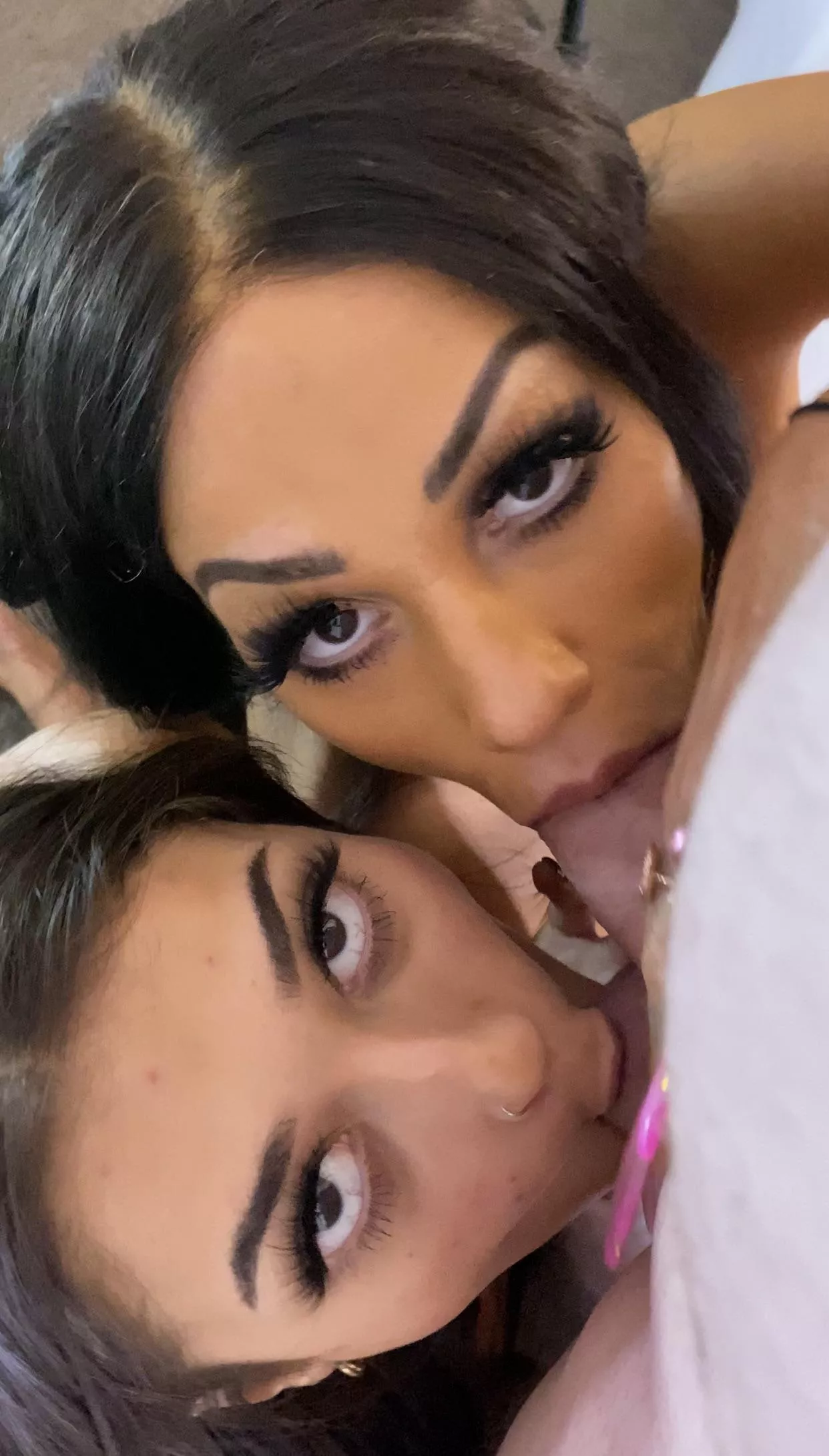 Me and a friend watching his face as we devour his COCK!