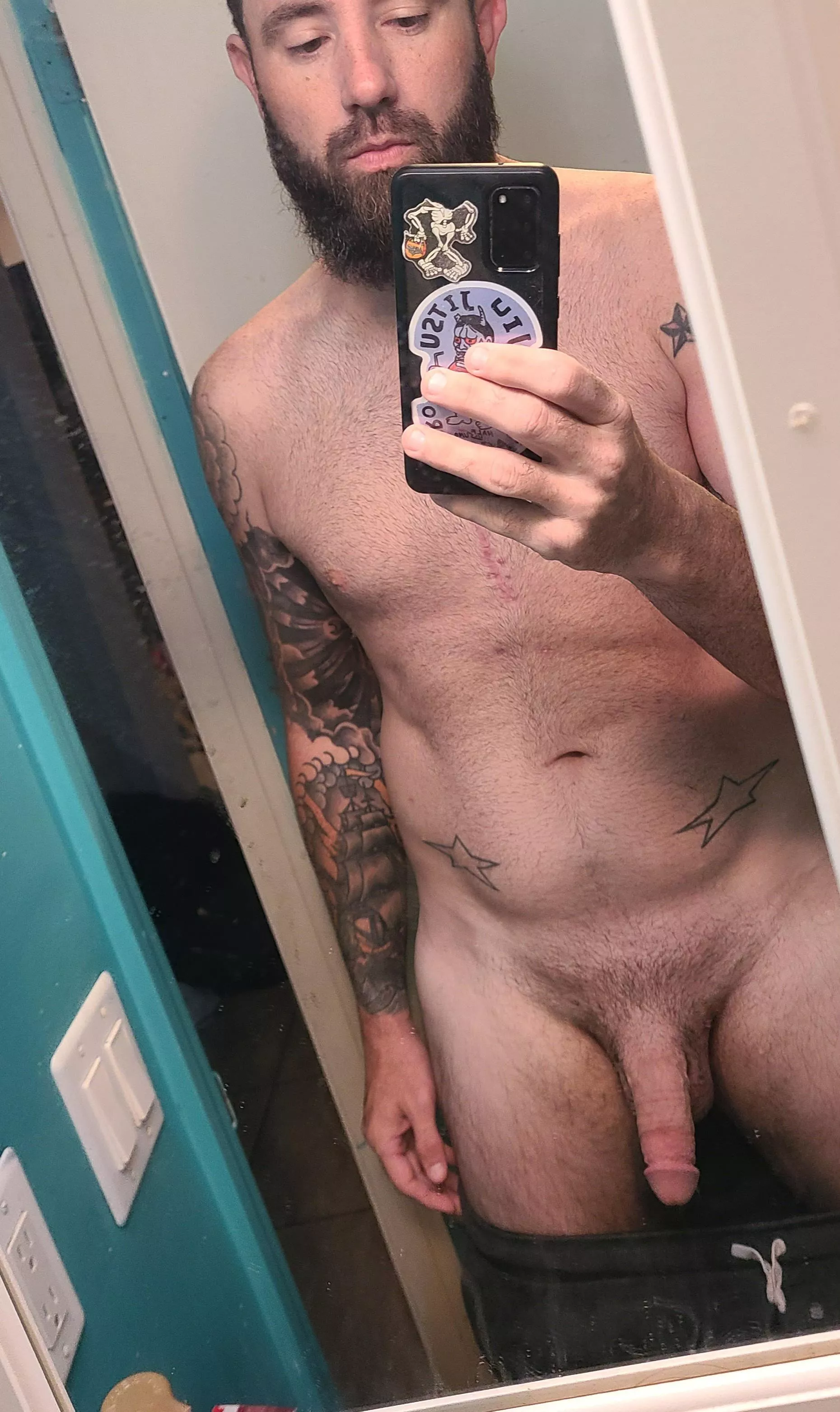 Scars, beard, tattoos, a little bit of it all [38]