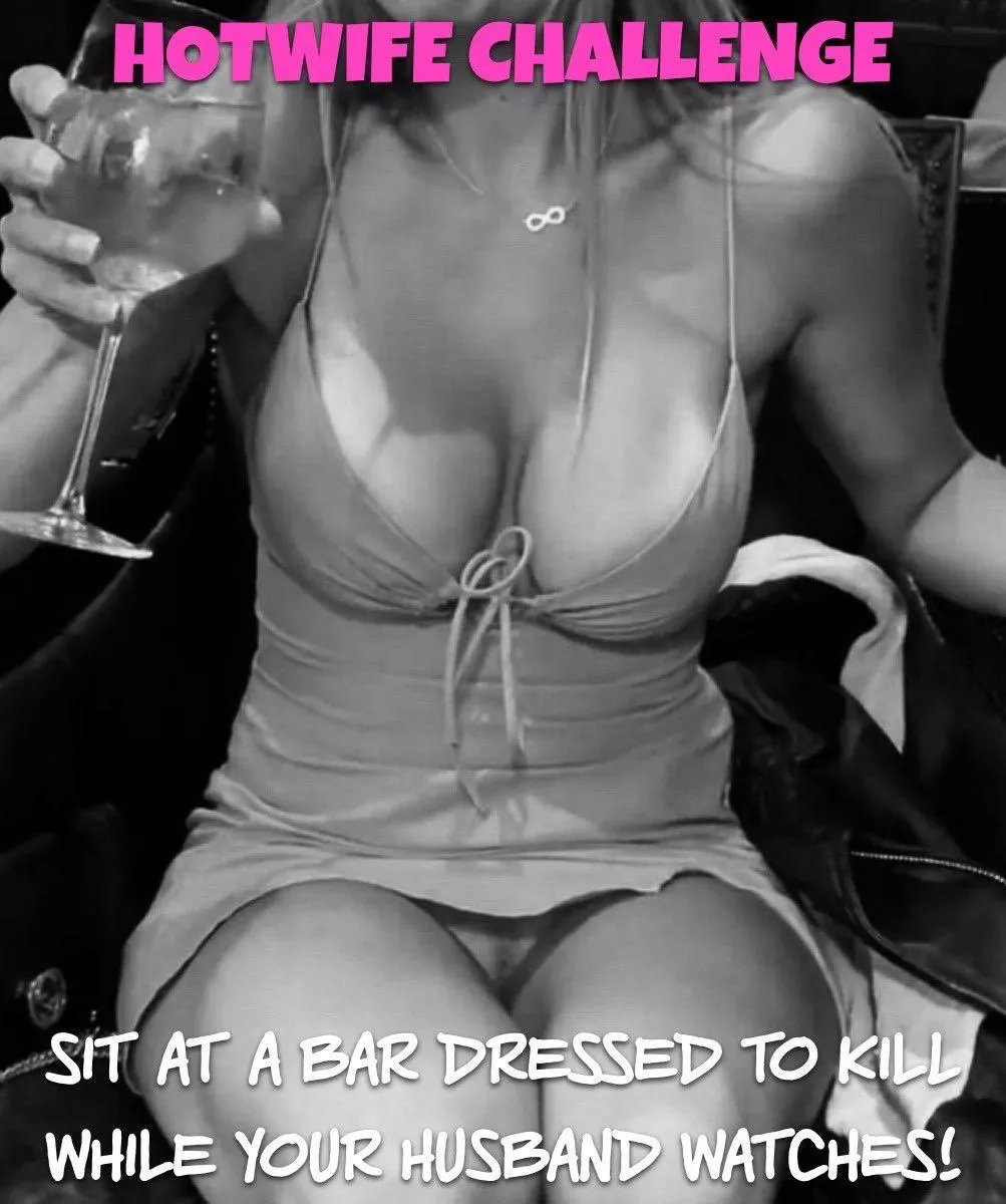 Sitting at the bar enjoying the attention she’s getting from the guys