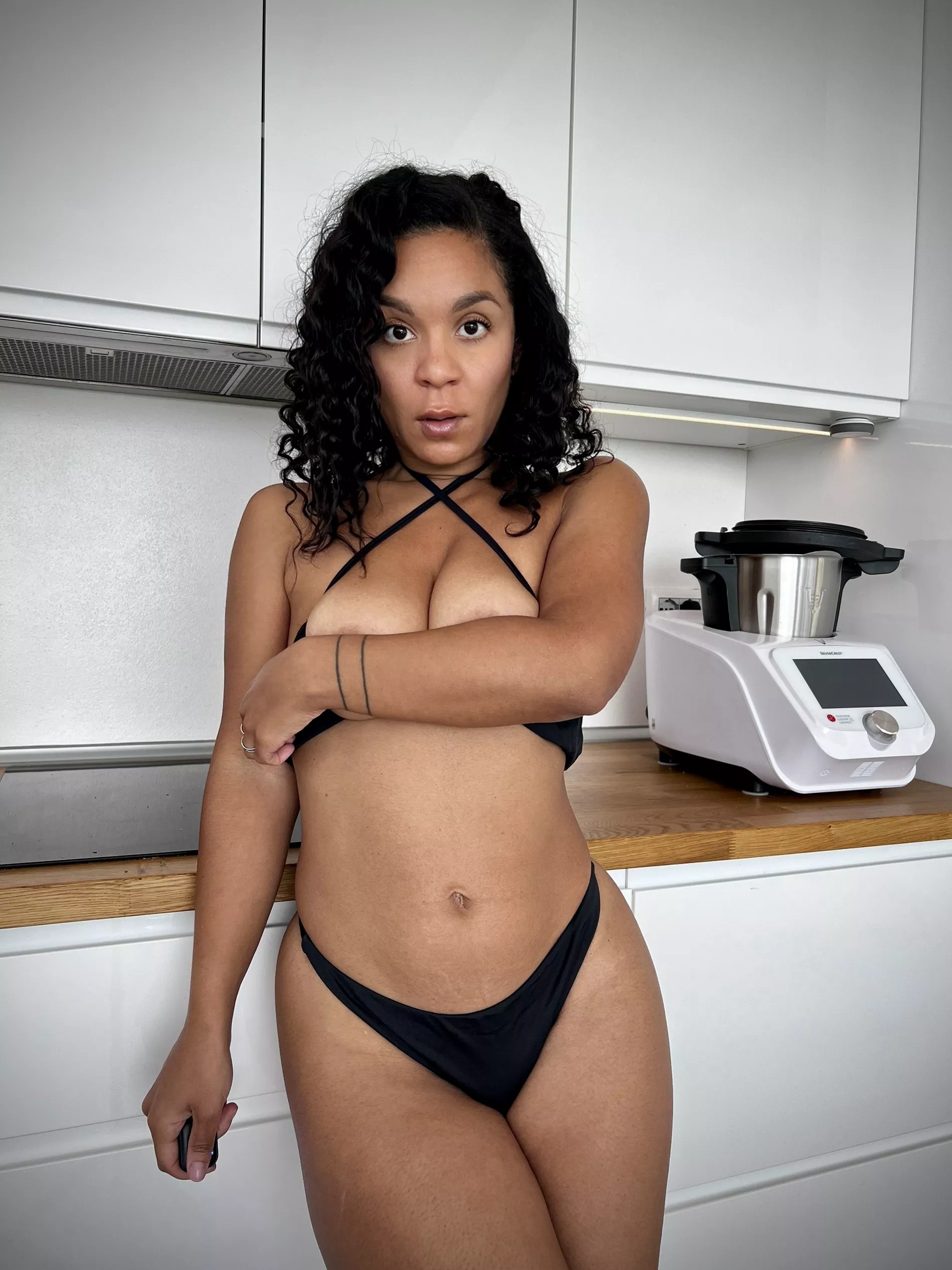 This MILF is waiting for you in the kitchen