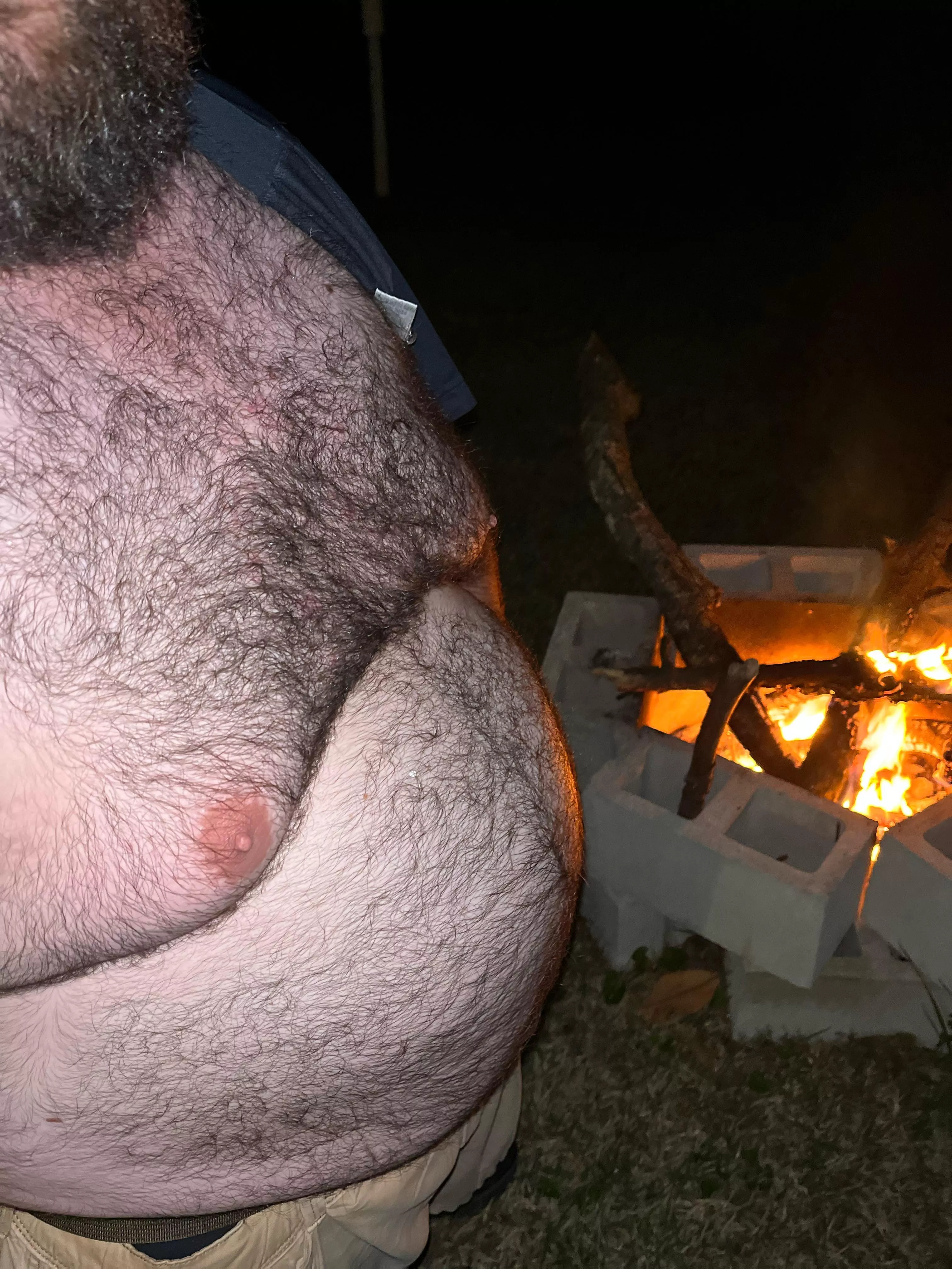 Chest hair in the ambience of a crackling fire… we’d start by me caressing your face and your fingers running through my chest hair…. Where the story goes… you decide.