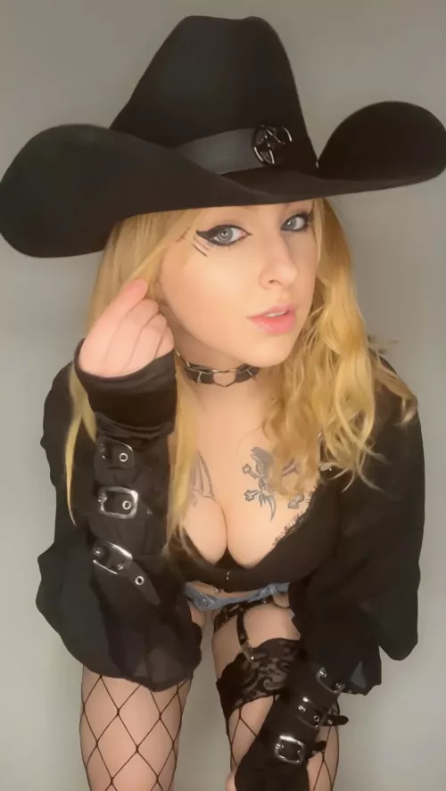 I am just a goth cutie that likes to wear cowboy hats