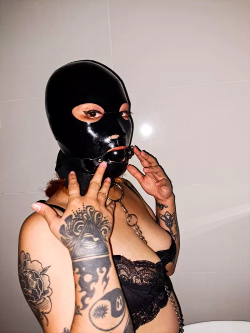 Collared, gagged and hooded