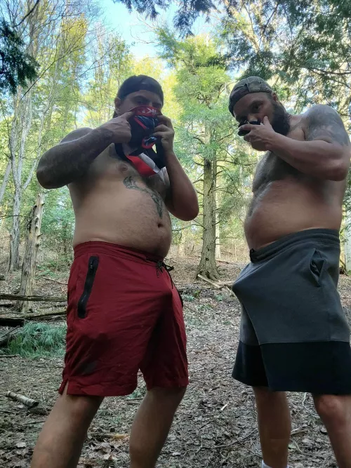 A couple of daddies sniffing each others jocks in the woods