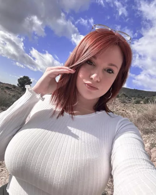 Busty red head