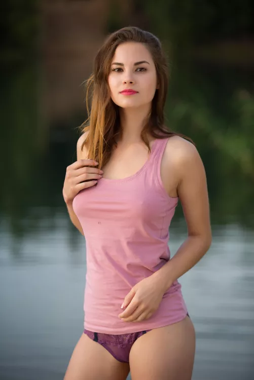 in a shirt on the lake