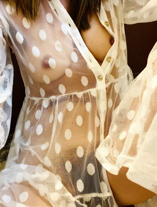 Peeking out of polka dots
