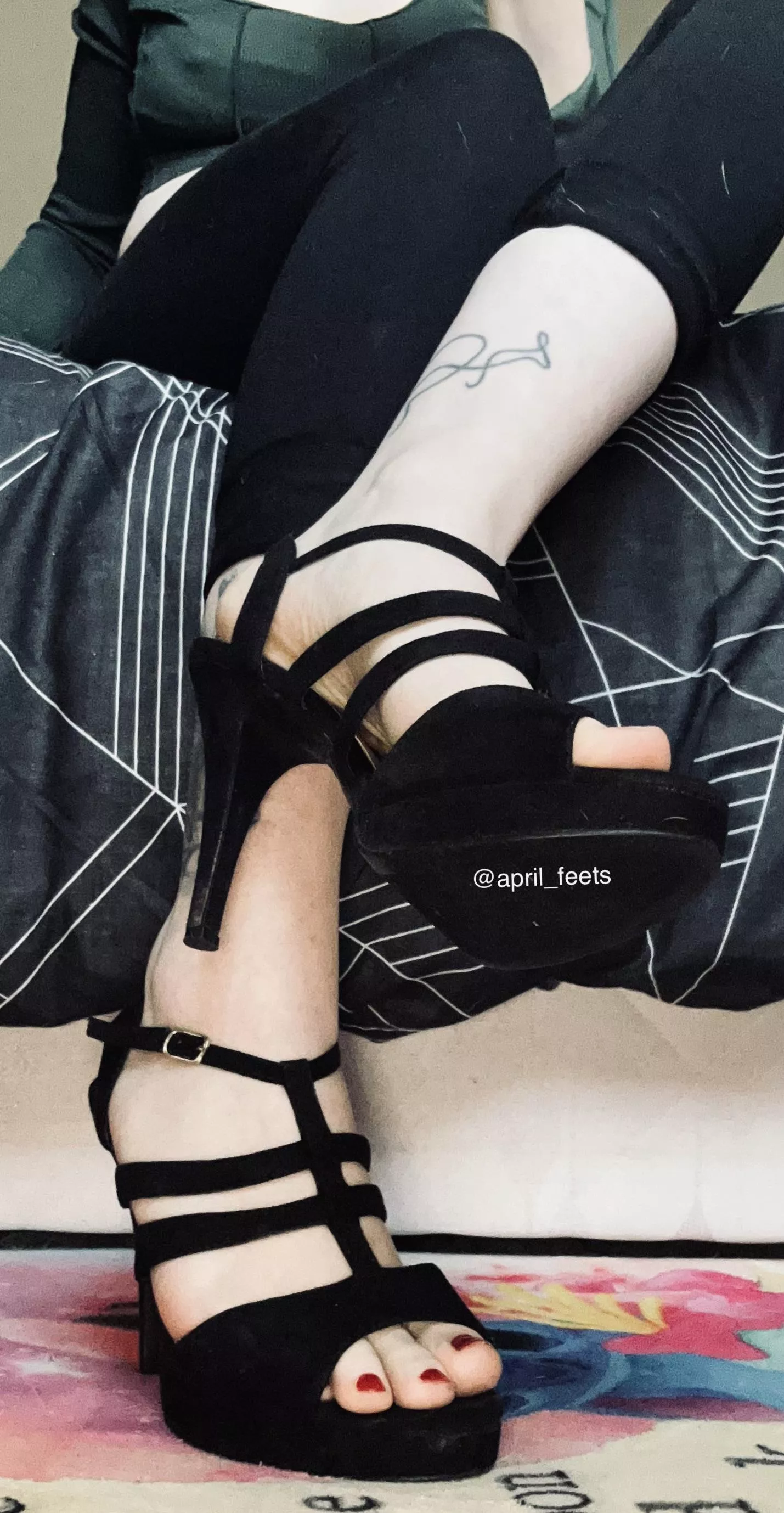 Red toes and little black heels