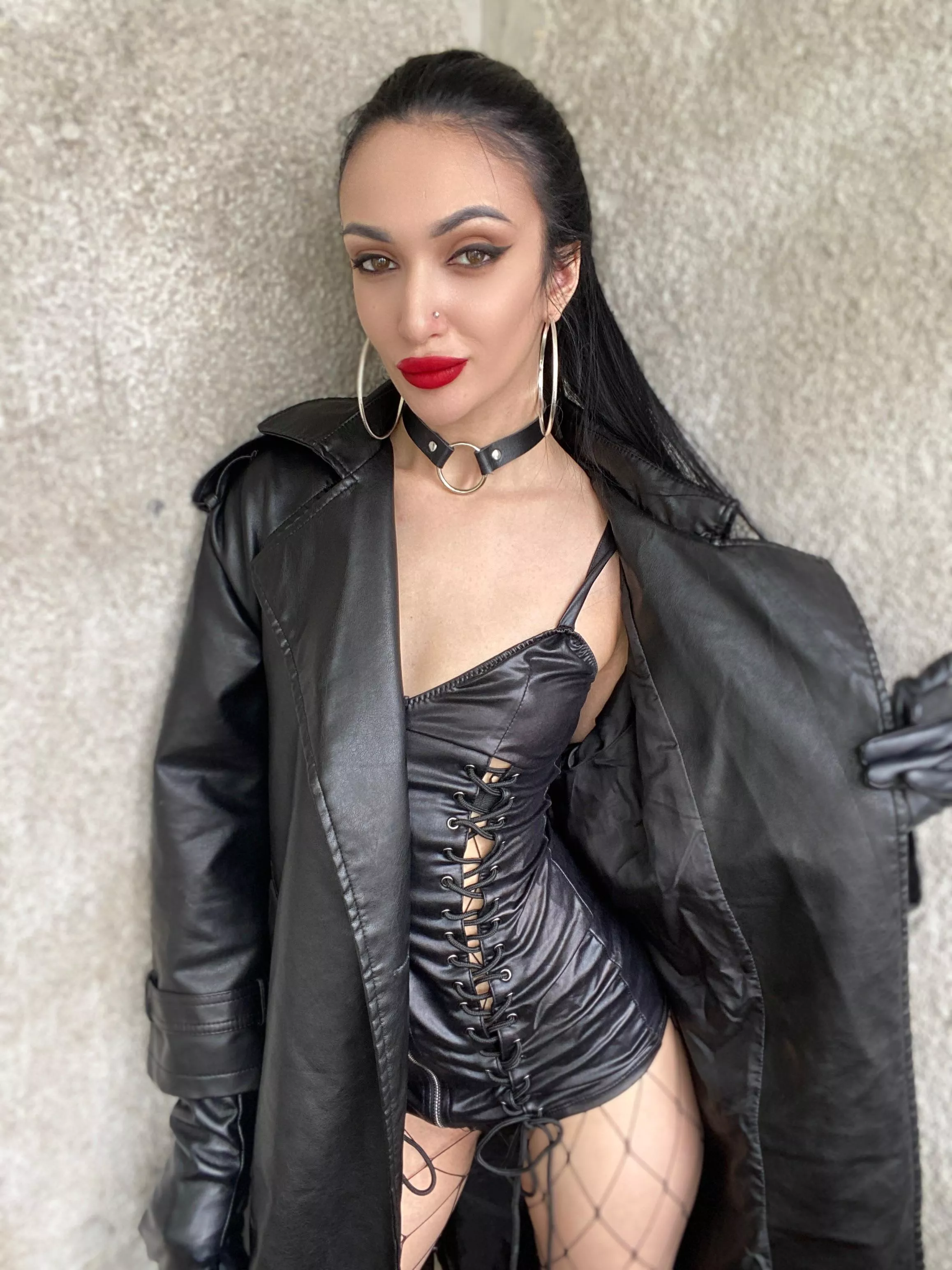 Brunette in leather and red lips