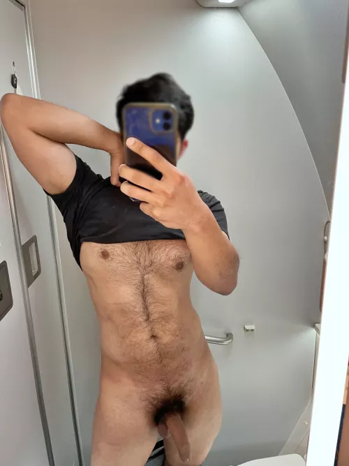 Checking my hairy torso on the airplane