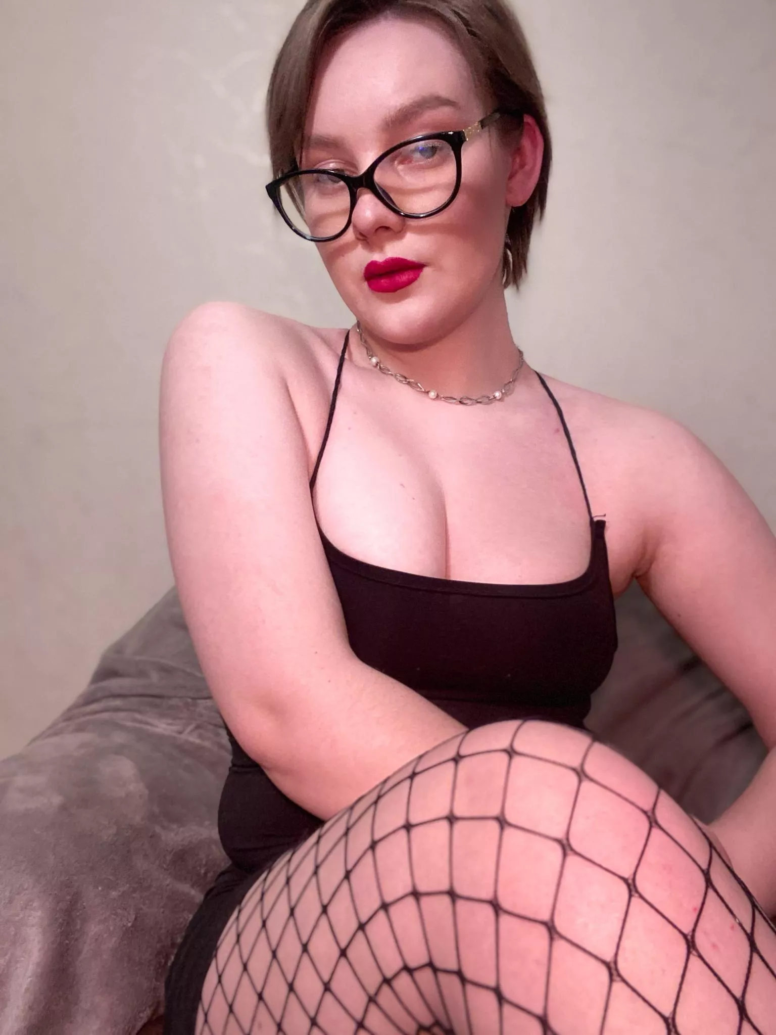 Glasses and black fishnets is the best match for a start