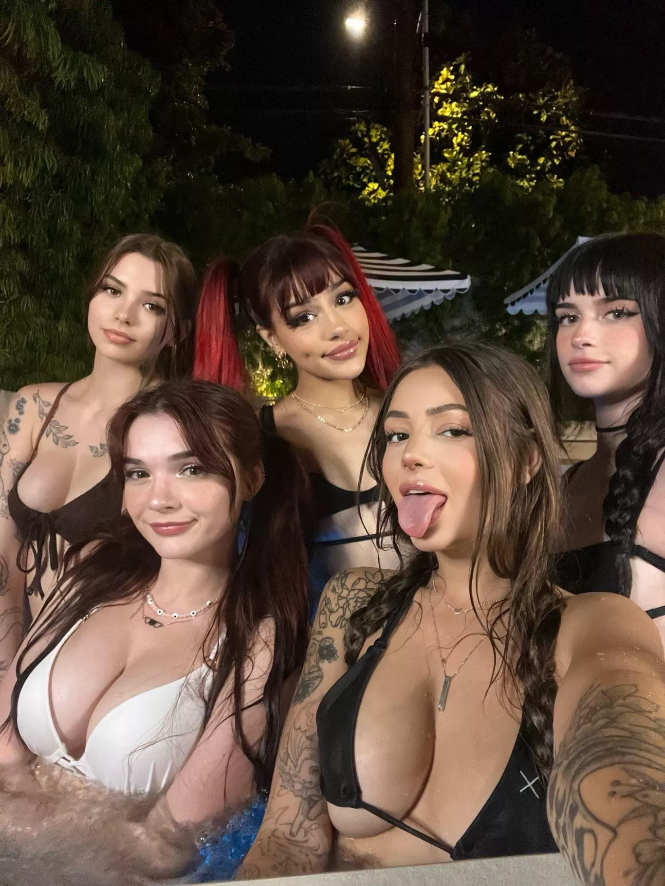 anyone got a name for far right, with her tongue out?