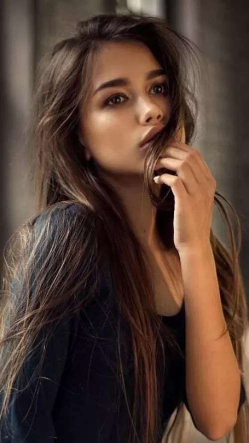 Daydreaming Brunette