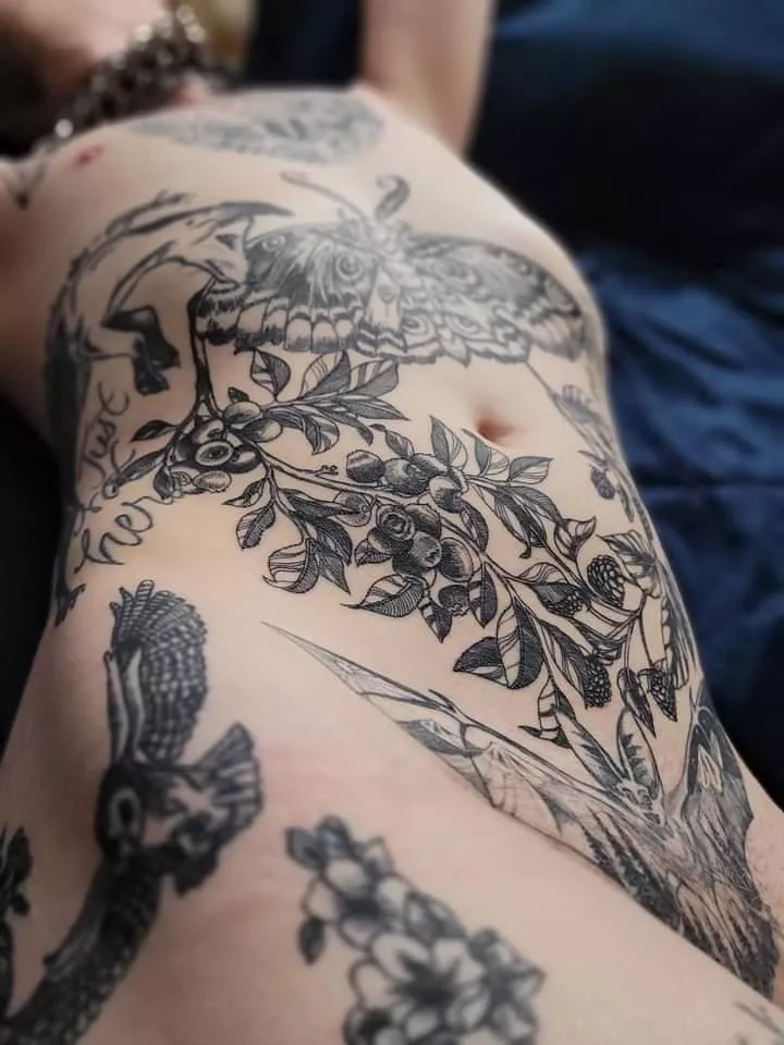 Happy Friday! What do you all think of my new stomach tattoo?