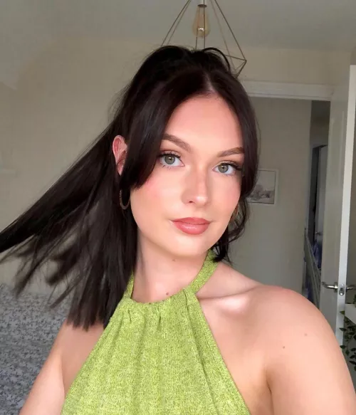 Brunette in green