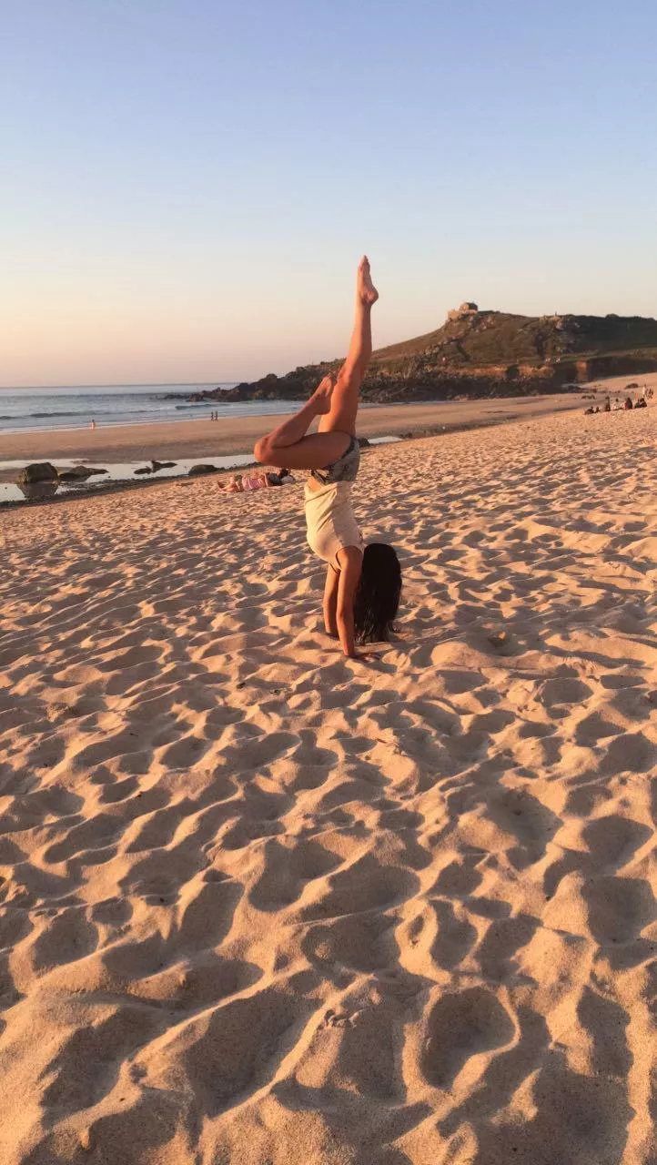 Handstand on a beach