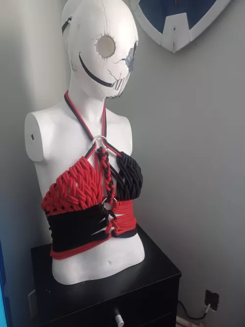 Harley Quinn inspired harness. Figure 8 weaves and corset tie