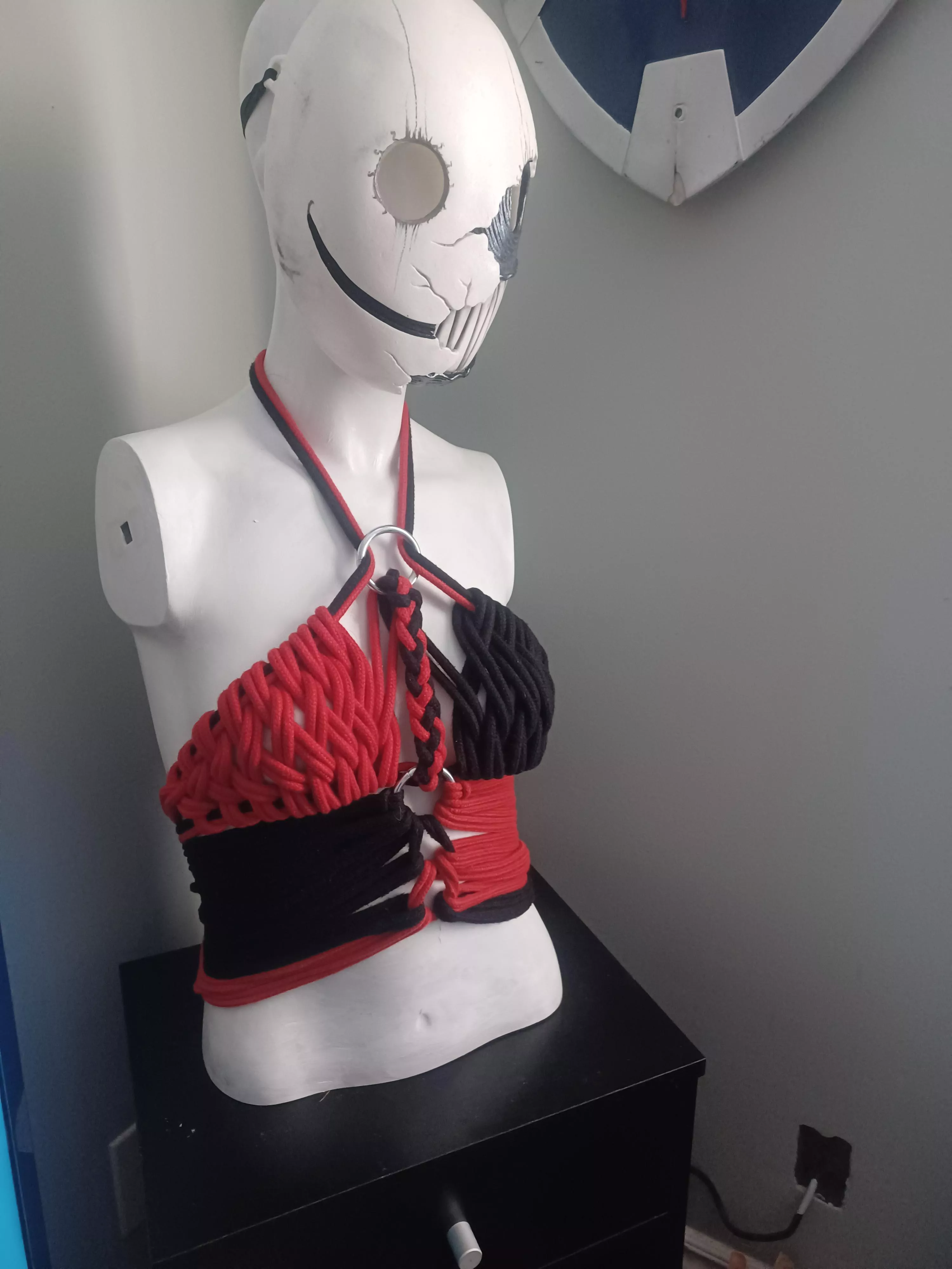 Harley Quinn inspired harness. Figure 8 weaves and corset tie